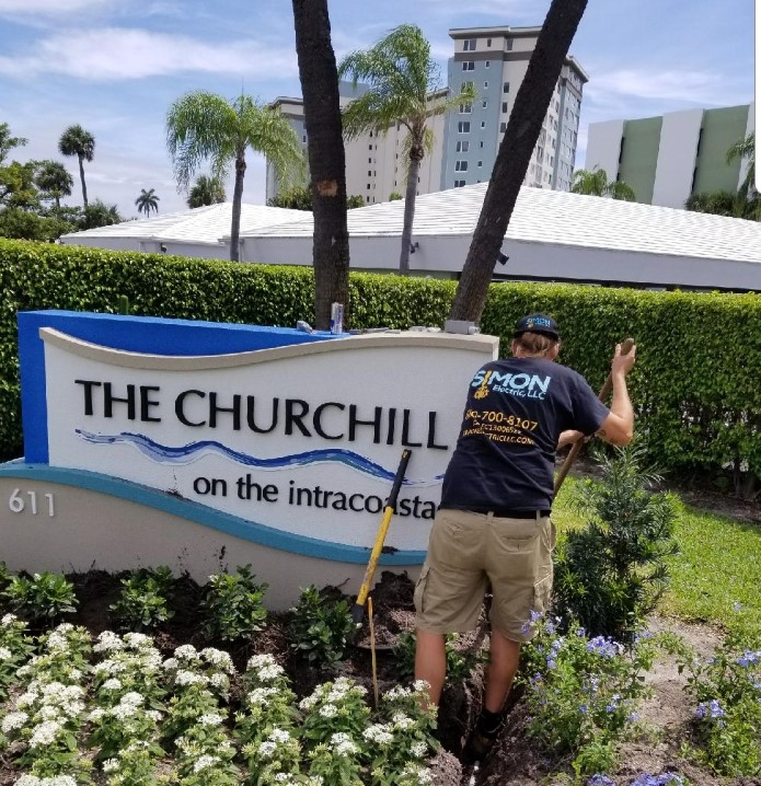 Installation of landscape lighting and signage in Delray Beach, FL