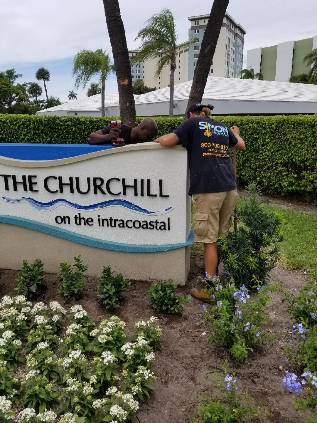 Installation of landscape lighting and signage in Delray Beach, FL