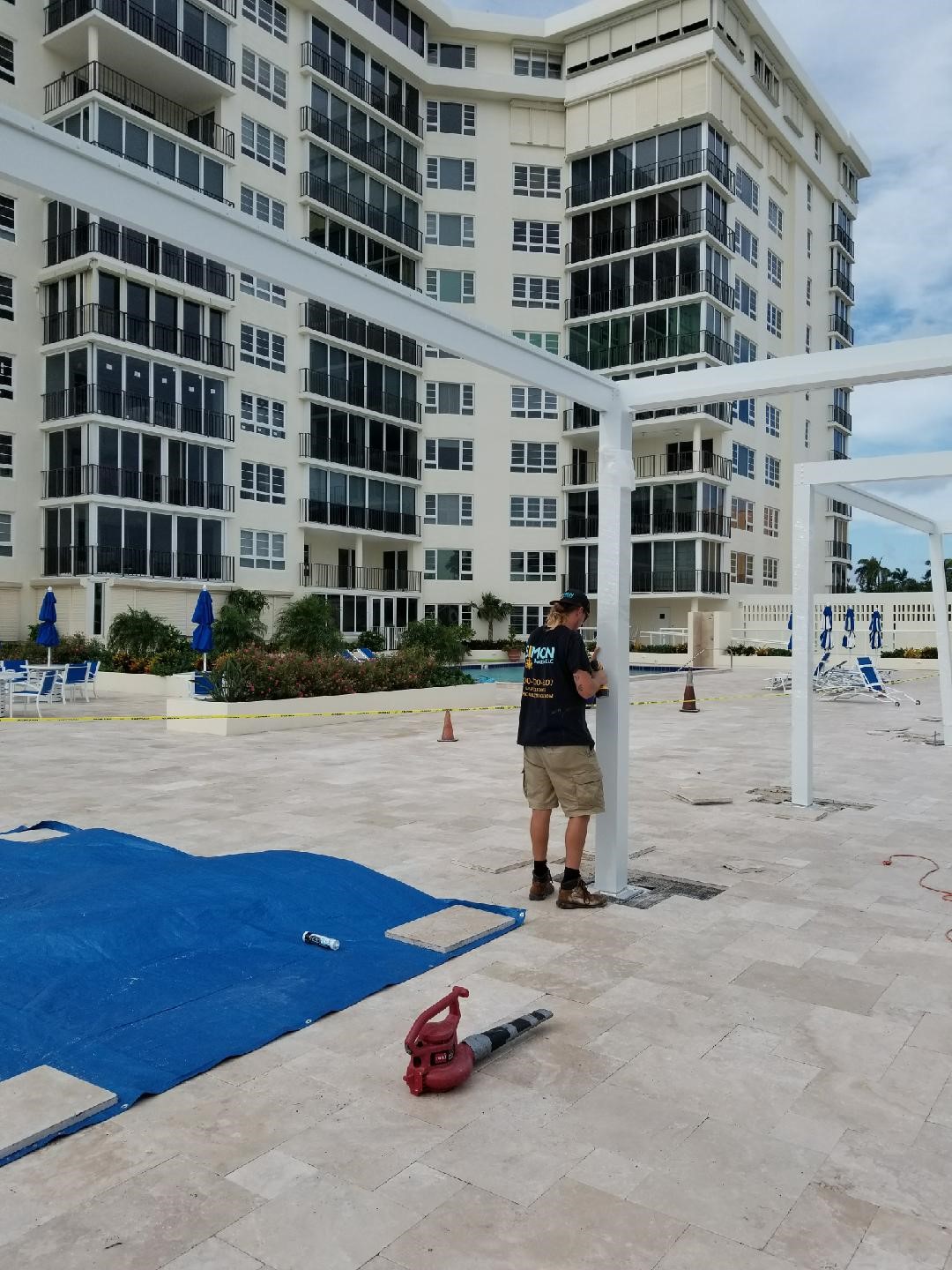 Drililng Holes & Running Conduit to Power Lighting & Fans in Delray Beach, FL
