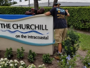 Installation of landscape lighting and signage in Delray Beach, FL