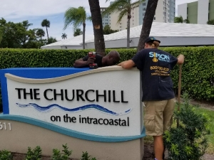 Installation of landscape lighting and signage in Delray Beach, FL