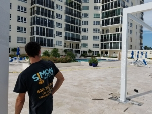 Drililng Holes & Running Conduit to Power Lighting & Fans in Delray Beach, FL