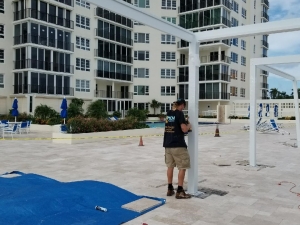 Drililng Holes & Running Conduit to Power Lighting & Fans in Delray Beach, FL